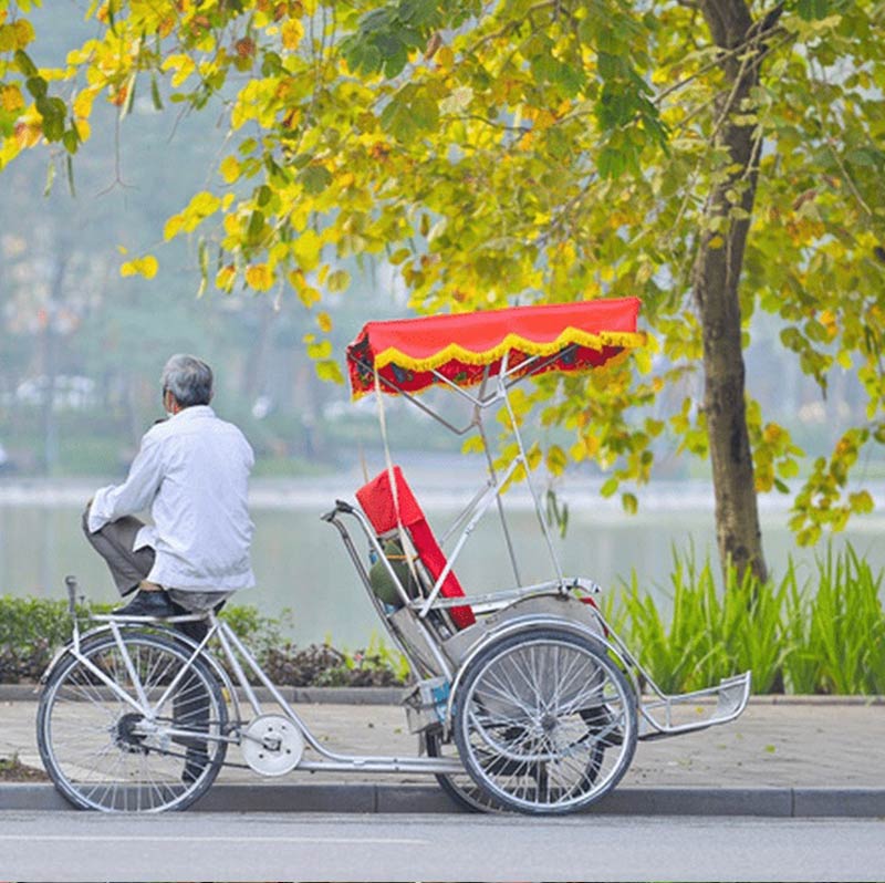 Experience the culture of riding a cyclo when traveling to Hanoi